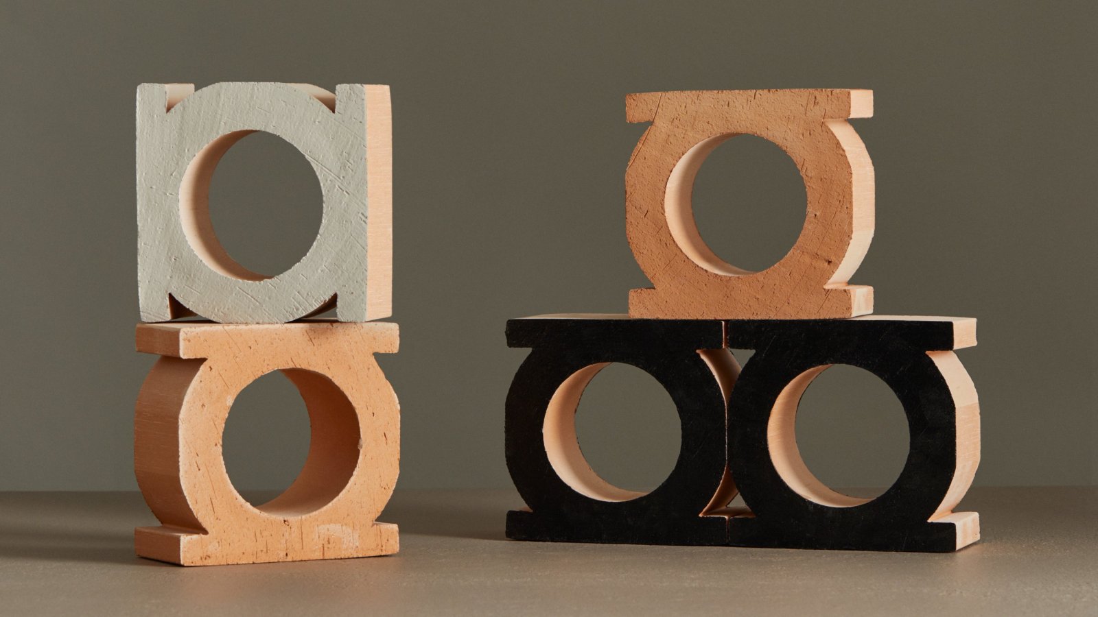 Jali terracotta blocks by Mutina stacked in all three colours