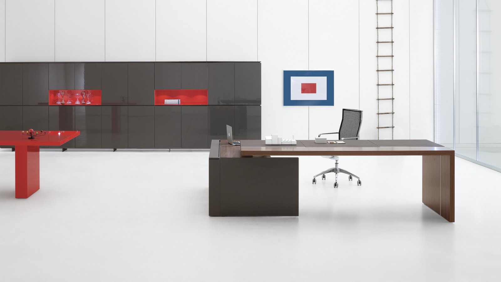 LED-lit niches in the shiny lacquered Ar.tu bookshelves