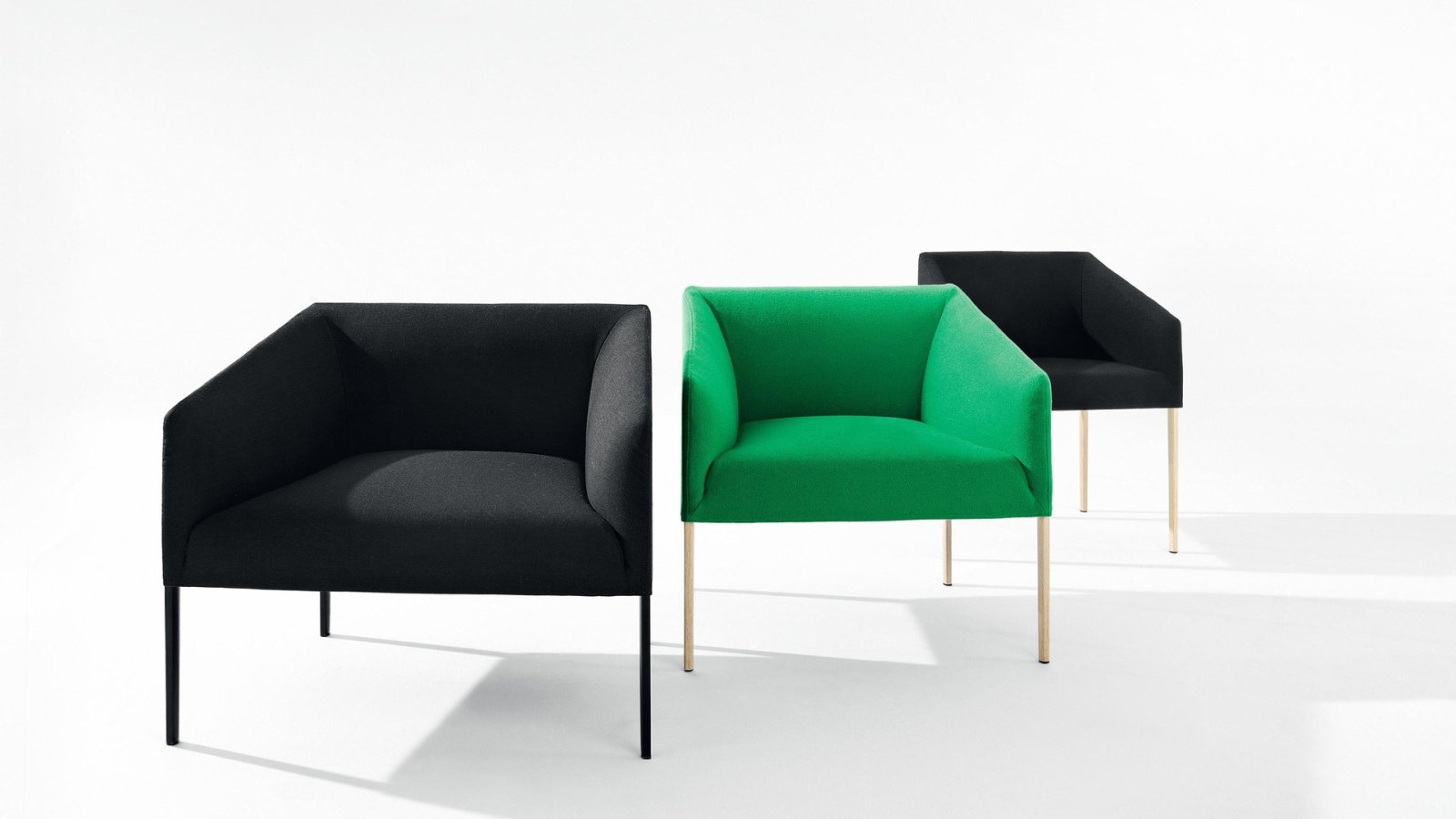 Saari armchair by Arper in the larger size, leather upholstery