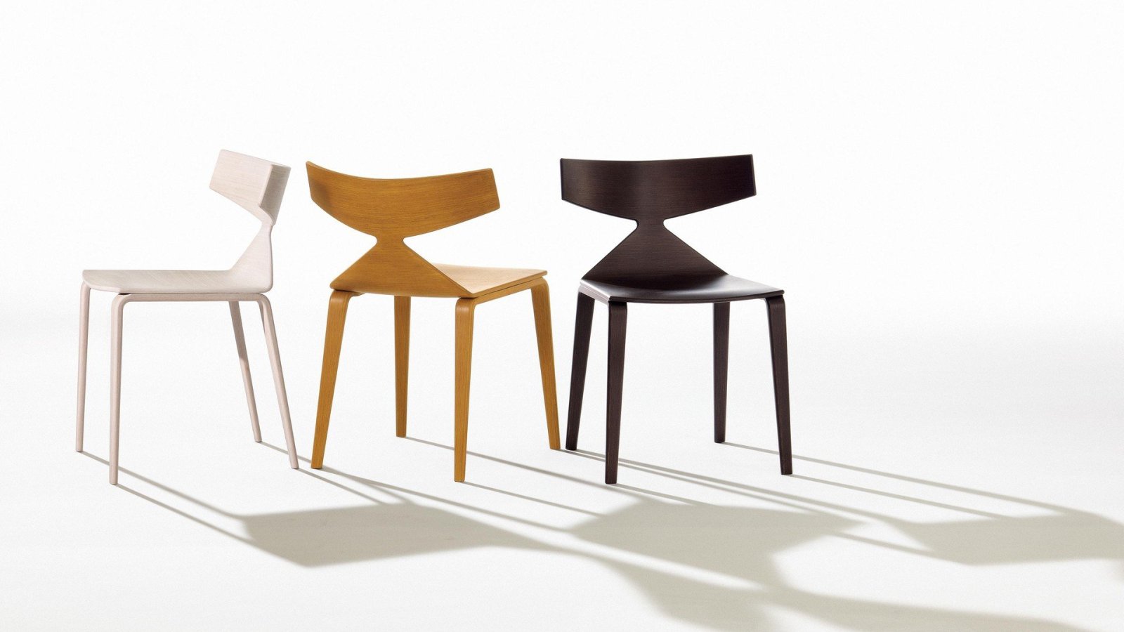 Saya design chair by Arper with oak veneered shell in a dining room