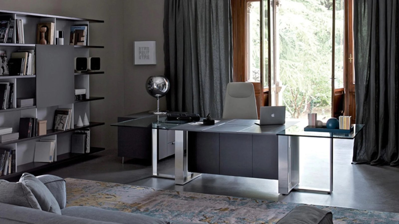Designer desk Altagamma by Estel with a stitched leather top on the aluminium frame