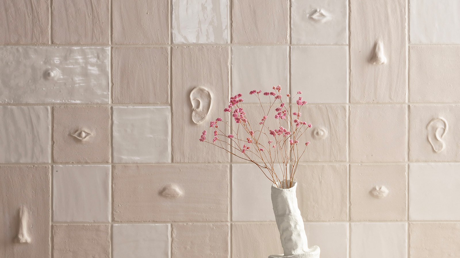 Chalk Matt wall with the Face composition from Faces & Figures by Mutina