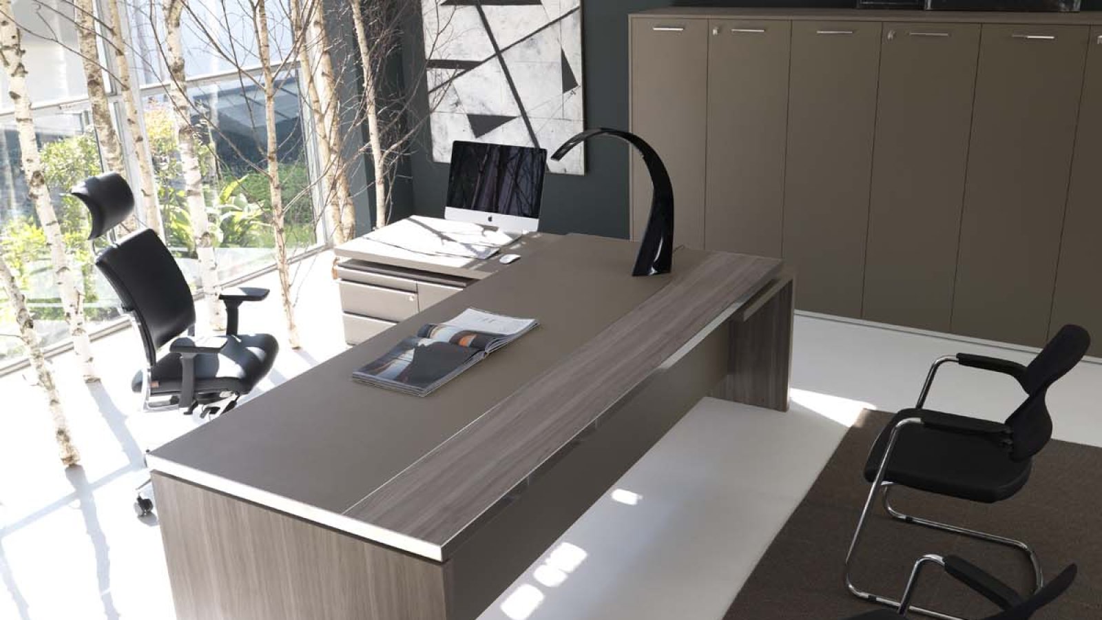 Athos executive desk by IVM with built-in Primofiore desk pad on an elm top