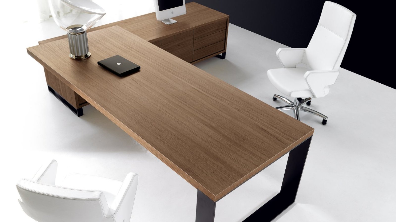 New Loop executive desk by IVM Office with walnut top and bronze ring leg