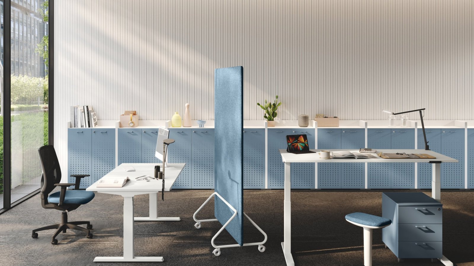 UP height-adjustable operative desk by Las Mobili in standing position with black T legs