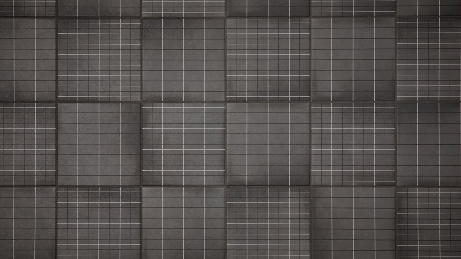Bathroom wall tiled with Aurore Charcoal Grid L by Mutina