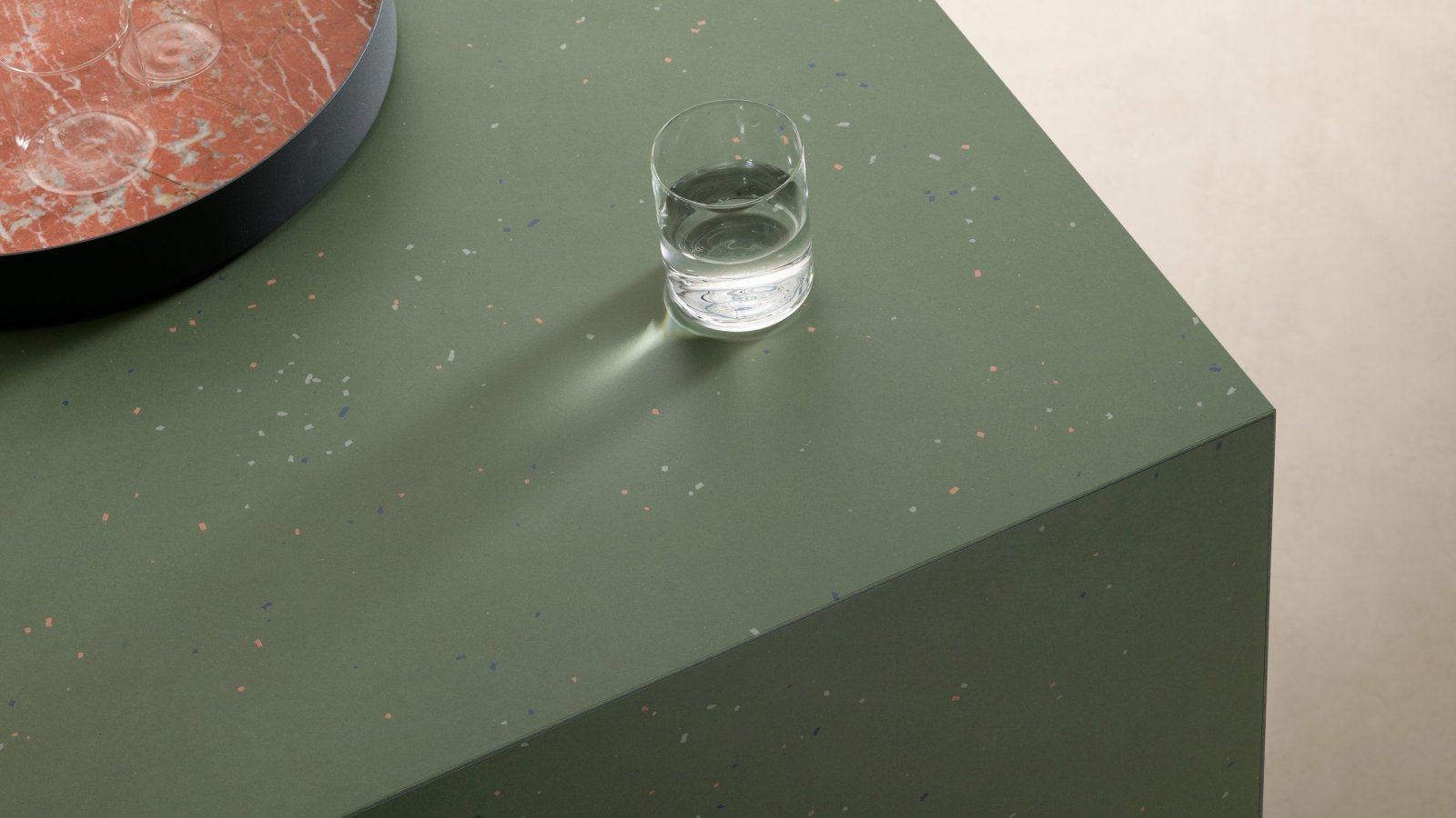 Primavera by Mutina porcelain surface with scattered ceramic chips