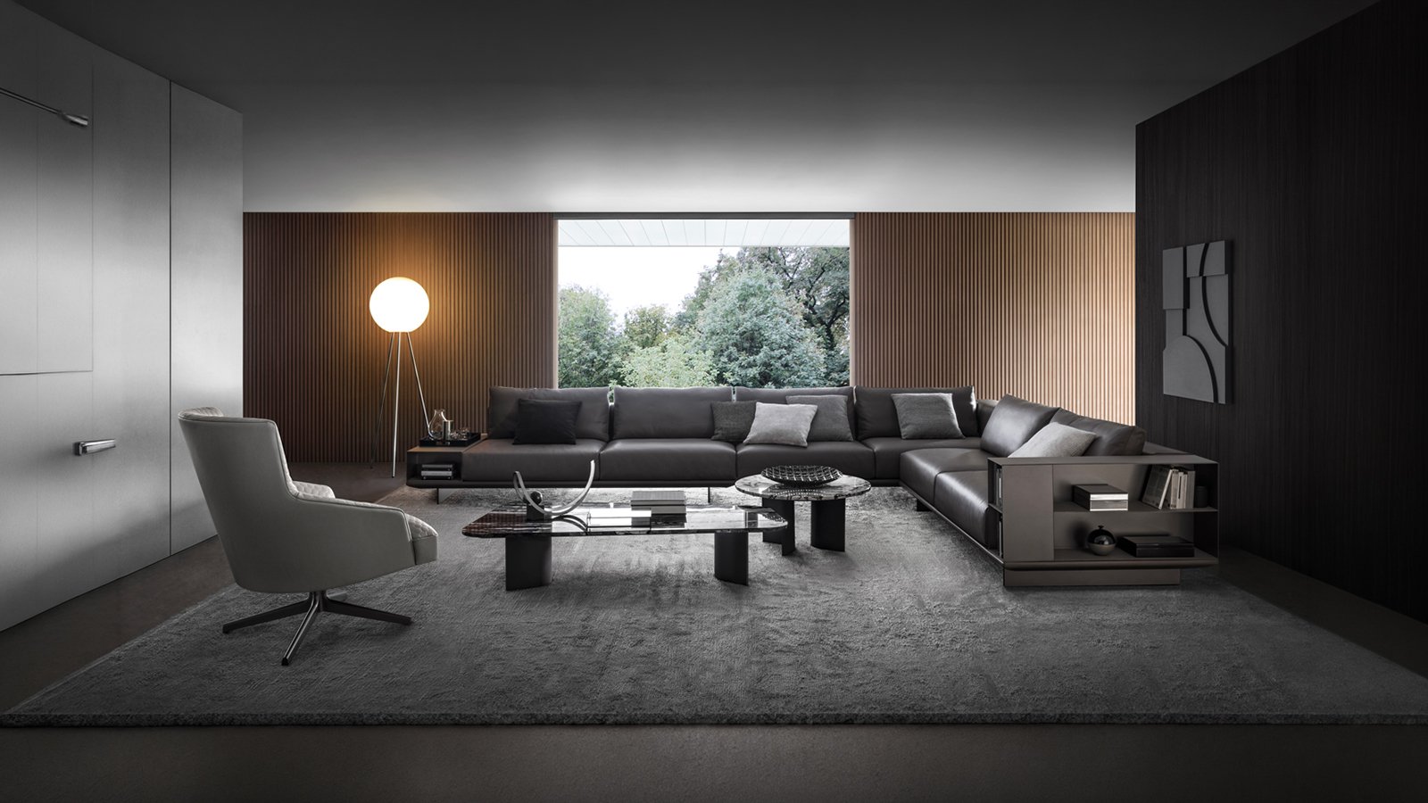 Asso modular sofa by i4Mariani with a side bookcase module instead of the right armrest