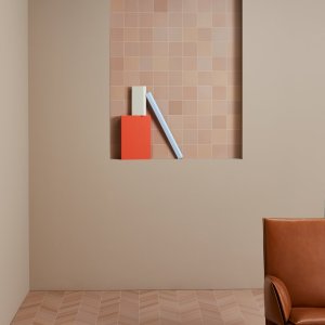 Chevron Mews tiles in Lead angled towards a sash window