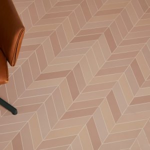 Mews tiles by Barber and Osgerby in Fog cladding a meeting room wall