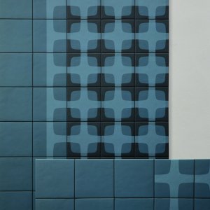 Break area clad in Betty by Mutina undulating grid