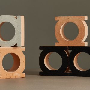 Jali terracotta blocks by Mutina stacked in all three colours