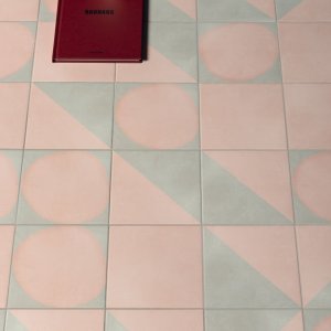 Futura Grid Black on the wall above a Futura Drop Black floor