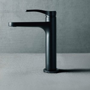 Designer taps in matt black: the AL/23 basin mixer on a pale stone basin
