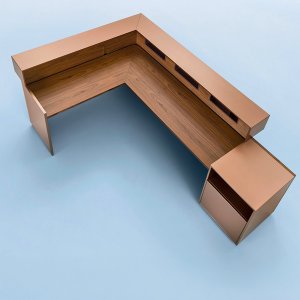 Overhanging raised unit of the Toki reception desk with painted metal niches