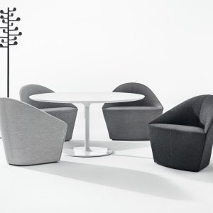 Larger Colina tub armchair in a hotel lobby