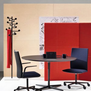Kinesit in a meeting room