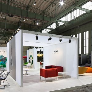 Leaf designer chairs around a Compact HPL table by Arper