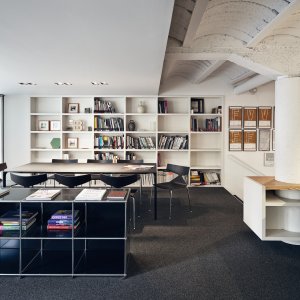 Cable tray fitted beneath a Nuur office desk by Arper