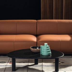 Fabric and leather combination on an Arper Shaal composition