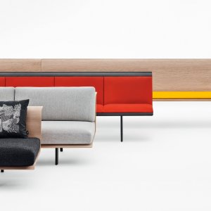 Zinta bench by Arper along a corridor wall