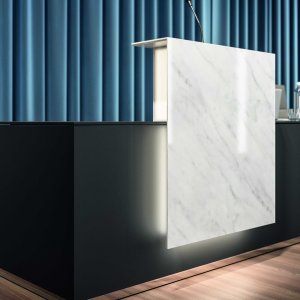 Lux counter in Lux walnut with illuminated shelves in a lobby