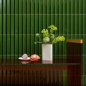 Reeded ceramic wall in Rombini by Mutina inside an executive office