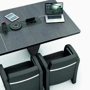Pull-out monitor stand raised on the extension of an iSixty desk