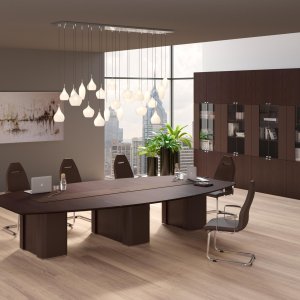 Coupè chair in perforated leather at the AlfaOmega executive desk