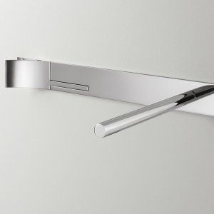 Detail of the Cut Plus wall-mounted mixer in polished steel