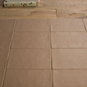 Covered courtyard clad in Bas-Relief tiles