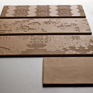 Executive bathroom clad in Bas-Relief by Patricia Urquiola