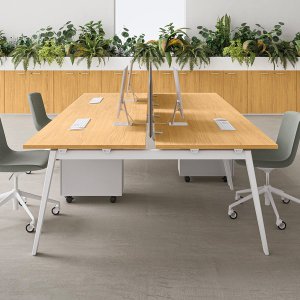 Trapezoidal modesty panel under an E-Place desk by DVO