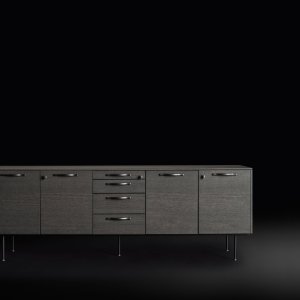 Standing-height Eleva meeting table with power outlet at the leg base