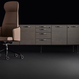 Stitched leather desk pad set flush into the Eleva desktop