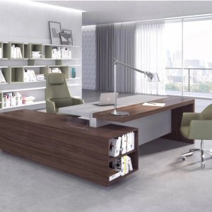 Ducale executive desk by Estel with the service unit set at a right angle and shelving behind