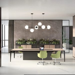 Executive desk Grand More by Estel with a pale top resting on the service unit at a right angle
