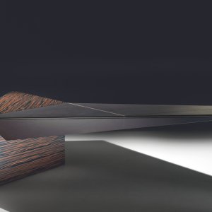 Euclideo low table 60 by 60 beside the executive desk