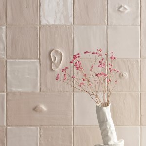 Chalk Matt wall with the Face composition from Faces & Figures by Mutina