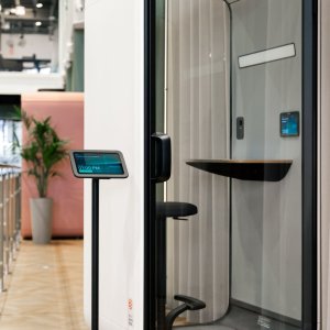 Electric height adjustable desk raised inside Framery One