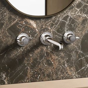 Kitchen sink with Flora mixer by Fantini, its swivel spout and separate spray