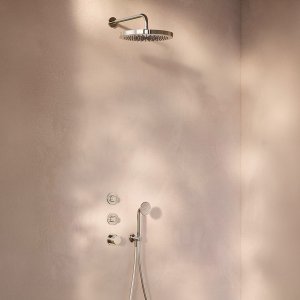 Fantini Flora hand shower resting on its wall bracket