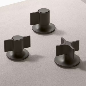 Two-wing handles on a Flora basin set in polished nickel