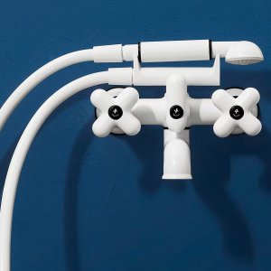Matt white I Balocchi basin set on a pale stone worktop