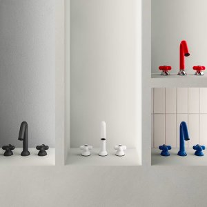 Basin mixer I Balocchi, wall-mounted, in blue against a slab of stone