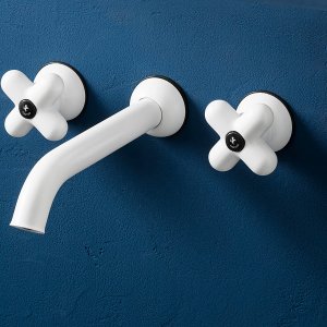 Fantini I Balocchi three-hole basin set in red and chrome on a blue basin