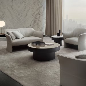 Lounge armchair Sella seen from the side