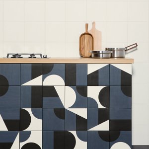 Plain Puzzle tiles on an office wall