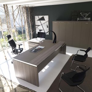 Athos executive desk by IVM with built-in Primofiore desk pad on an elm top