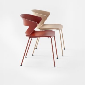 Swivel Kicca on four feet without castors in a small interview room